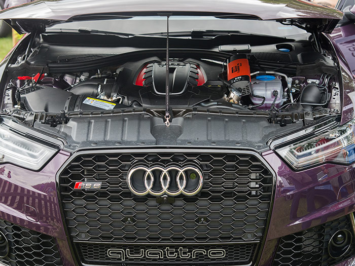 Under the hood of a purple Audi