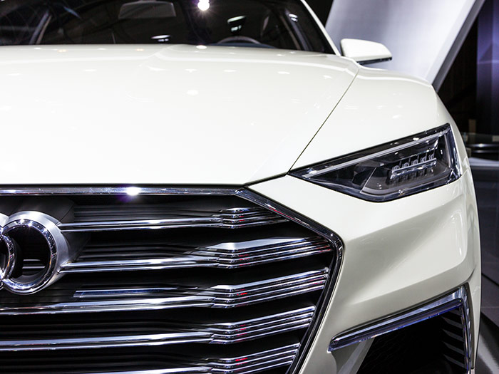 Extreme close up of white Audi