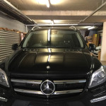 Black Mercedes in a garage