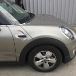 Side view of a grey Mini