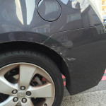 Grey car with scratches